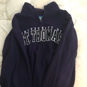 University of St. Thomas (MN) sweatshirt.